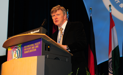 Photo fo Allan Glanville speaking at an ISHLT Annual Meeting