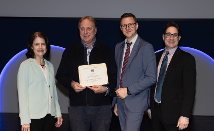 Greg Snell receiving 2024 Frank Pagani Mentorship Award