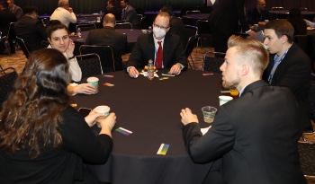 Photo of a group sitting at a table